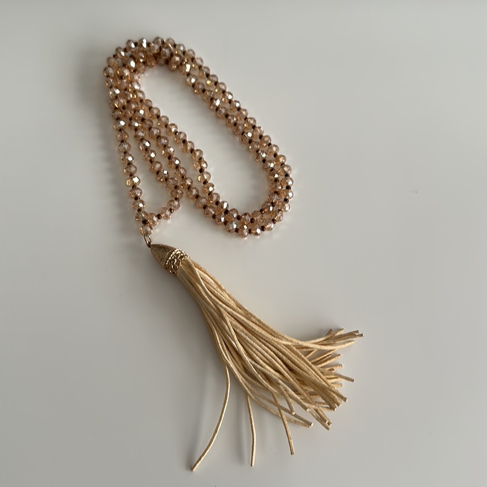 Gorgeous Statement Necklace with iridescent bead design gold accents and tassel